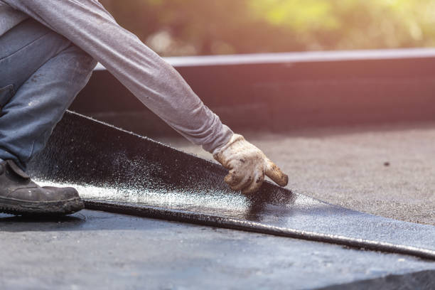 Professional Emergency Waterproofing technician working in Wheaton, MN
